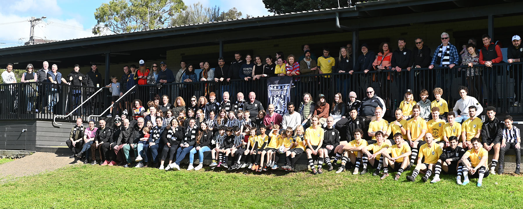 Group photo at Sumner Park clubrooms. Gem Photography.